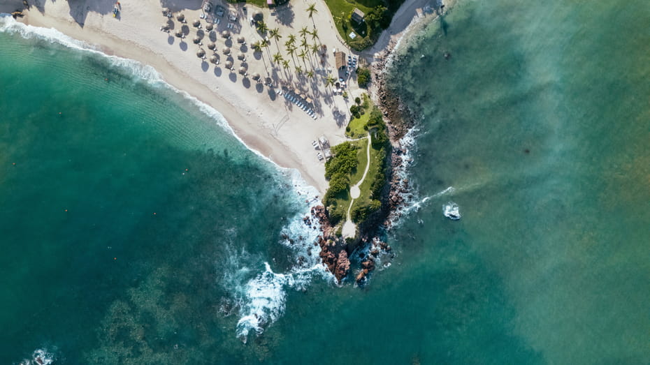 Four Seasons Punta Mita resort overlooking the Pacific Ocean with tropical landscape