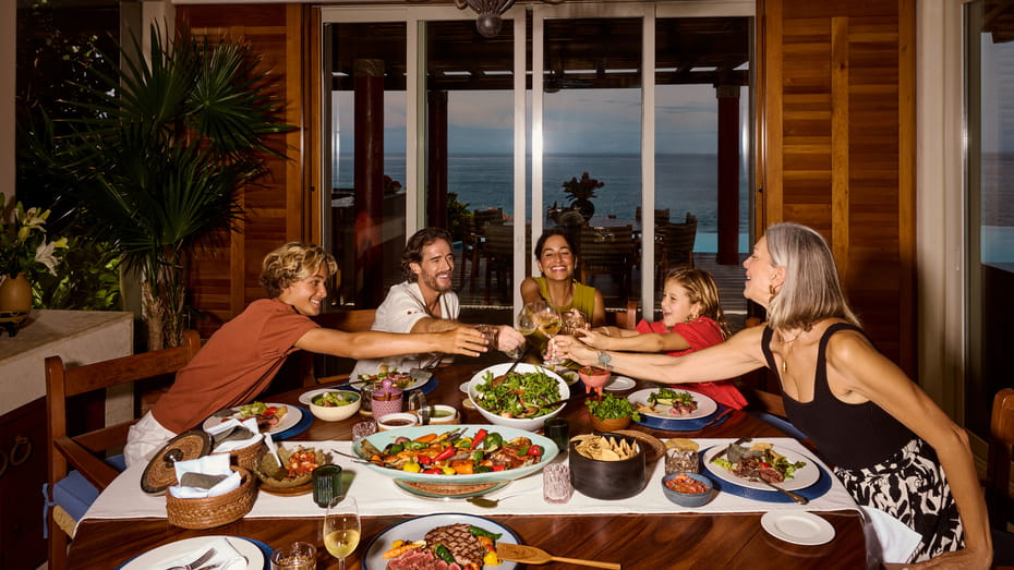 Multi-generational family dining together at Four Seasons Punta Mita