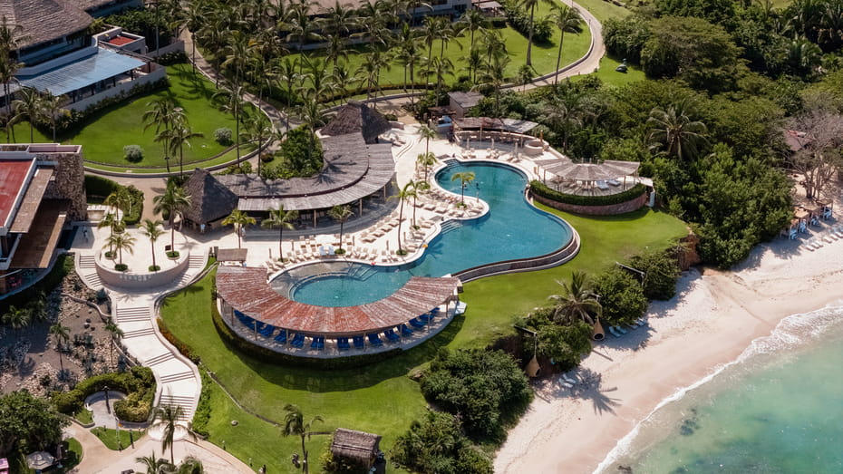 Aerial view of Four Seasons Punta Mita resort nestled in nature preserve