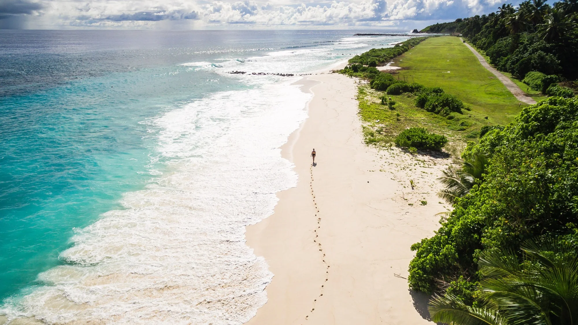 Aerial perspective of Fregate Island's rewilded landscape and conservation areas.